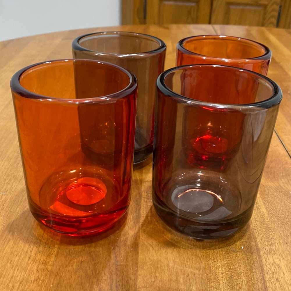 NWT.  Set of 4, large, votive candle holders.